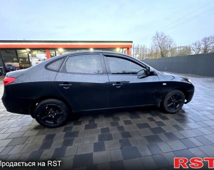 Черный Хендай Элантра, объемом двигателя 1.6 л и пробегом 261 тыс. км за 4799 $, фото 6 на Automoto.ua