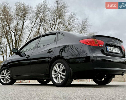 Чорний Хендай Елантра, об'ємом двигуна 2 л та пробігом 240 тис. км за 7850 $, фото 5 на Automoto.ua