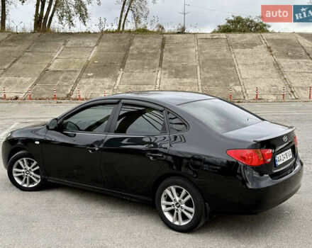 Чорний Хендай Елантра, об'ємом двигуна 2 л та пробігом 240 тис. км за 7850 $, фото 6 на Automoto.ua