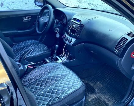 Черный Хендай Элантра, объемом двигателя 1.6 л и пробегом 158 тыс. км за 6800 $, фото 7 на Automoto.ua