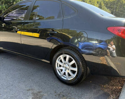 Черный Хендай Элантра, объемом двигателя 1.59 л и пробегом 113 тыс. км за 6500 $, фото 5 на Automoto.ua