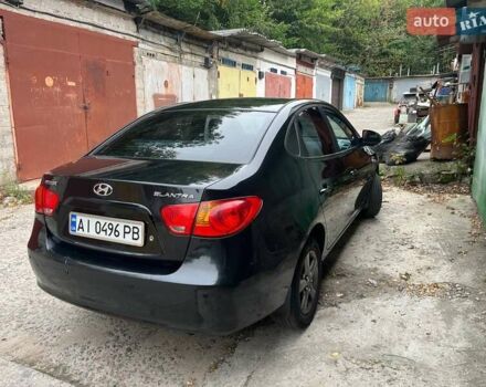 Черный Хендай Элантра, объемом двигателя 1.6 л и пробегом 350 тыс. км за 4750 $, фото 4 на Automoto.ua