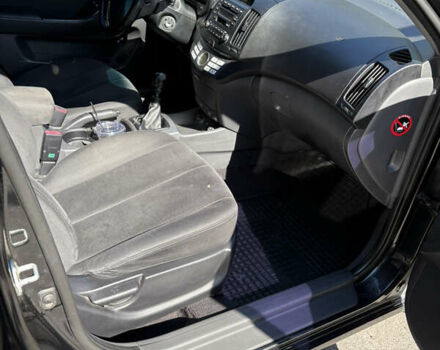 Черный Хендай Элантра, объемом двигателя 1.59 л и пробегом 113 тыс. км за 6500 $, фото 9 на Automoto.ua