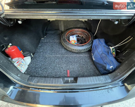 Черный Хендай Элантра, объемом двигателя 1.59 л и пробегом 240 тыс. км за 6257 $, фото 12 на Automoto.ua