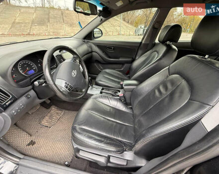 Чорний Хендай Елантра, об'ємом двигуна 2 л та пробігом 240 тис. км за 7850 $, фото 12 на Automoto.ua