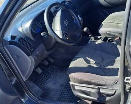 Черный Хендай Элантра, объемом двигателя 1.59 л и пробегом 255 тыс. км за 5000 $, фото 6 на Automoto.ua