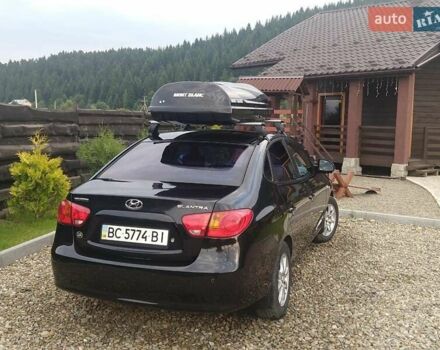 Черный Хендай Элантра, объемом двигателя 1.59 л и пробегом 210 тыс. км за 5900 $, фото 4 на Automoto.ua