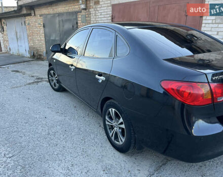 Черный Хендай Элантра, объемом двигателя 1.59 л и пробегом 240 тыс. км за 6257 $, фото 4 на Automoto.ua