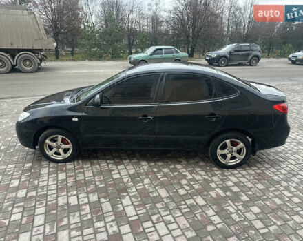 Черный Хендай Элантра, объемом двигателя 1.59 л и пробегом 242 тыс. км за 5999 $, фото 4 на Automoto.ua