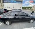 Черный Хендай Элантра, объемом двигателя 1.59 л и пробегом 185 тыс. км за 5500 $, фото 3 на Automoto.ua
