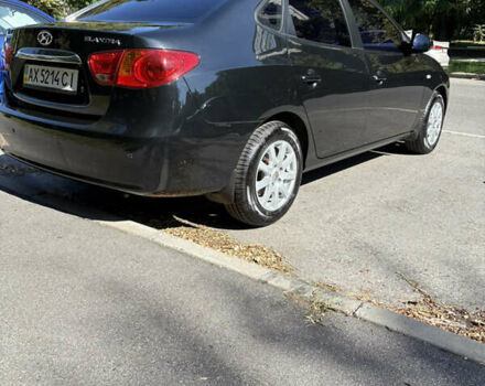 Черный Хендай Элантра, объемом двигателя 1.59 л и пробегом 113 тыс. км за 6500 $, фото 7 на Automoto.ua