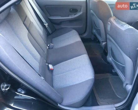 Чорний Хендай Елантра, об'ємом двигуна 1.6 л та пробігом 66 тис. км за 6000 $, фото 9 на Automoto.ua