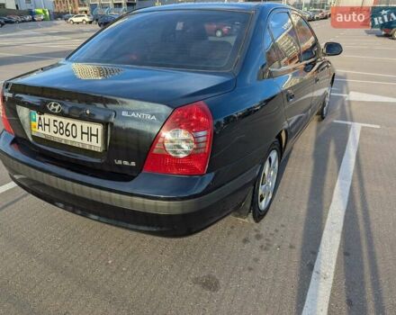 Черный Хендай Элантра, объемом двигателя 1.6 л и пробегом 146 тыс. км за 5900 $, фото 7 на Automoto.ua