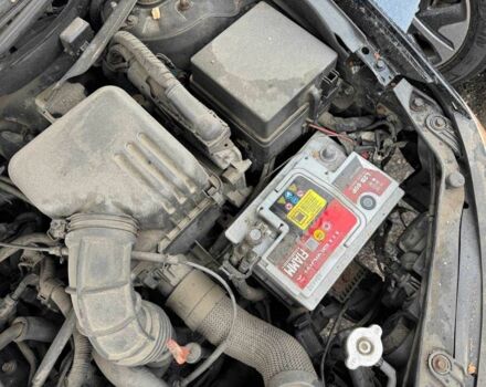 Черный Хендай Элантра, объемом двигателя 1.6 л и пробегом 160 тыс. км за 2000 $, фото 3 на Automoto.ua