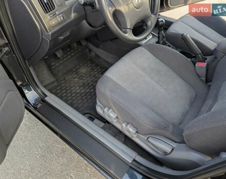 Черный Хендай Элантра, объемом двигателя 1.6 л и пробегом 146 тыс. км за 5900 $, фото 16 на Automoto.ua