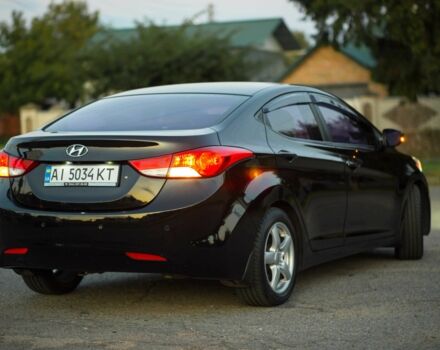 Черный Хендай Элантра, объемом двигателя 1.6 л и пробегом 149 тыс. км за 8350 $, фото 3 на Automoto.ua