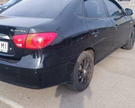 Черный Хендай Элантра, объемом двигателя 1.59 л и пробегом 213 тыс. км за 5500 $, фото 5 на Automoto.ua
