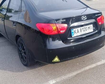 Черный Хендай Элантра, объемом двигателя 1.59 л и пробегом 213 тыс. км за 5500 $, фото 4 на Automoto.ua
