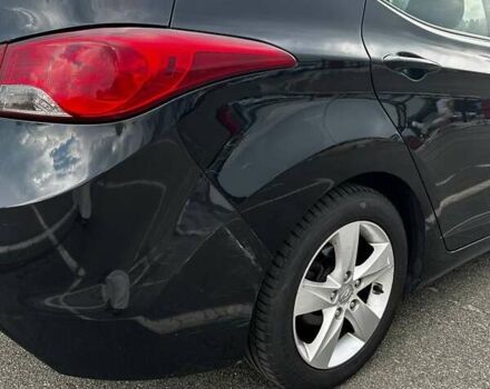 Черный Хендай Элантра, объемом двигателя 1.8 л и пробегом 210 тыс. км за 7599 $, фото 11 на Automoto.ua