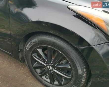 Черный Хендай Элантра, объемом двигателя 1.8 л и пробегом 244 тыс. км за 6950 $, фото 7 на Automoto.ua