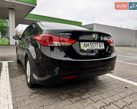 Черный Хендай Элантра, объемом двигателя 1.8 л и пробегом 130 тыс. км за 7300 $, фото 6 на Automoto.ua