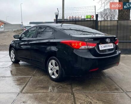 Черный Хендай Элантра, объемом двигателя 1.8 л и пробегом 221 тыс. км за 8990 $, фото 4 на Automoto.ua