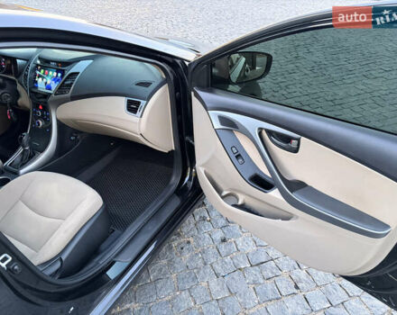 Чорний Хендай Елантра, об'ємом двигуна 1.8 л та пробігом 84 тис. км за 11000 $, фото 33 на Automoto.ua