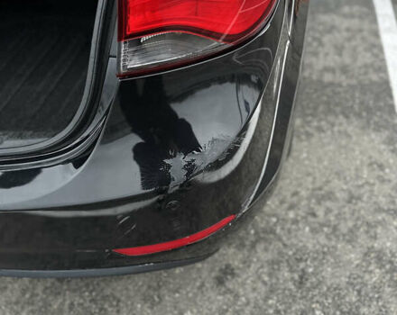 Черный Хендай Элантра, объемом двигателя 1.8 л и пробегом 200 тыс. км за 9500 $, фото 42 на Automoto.ua