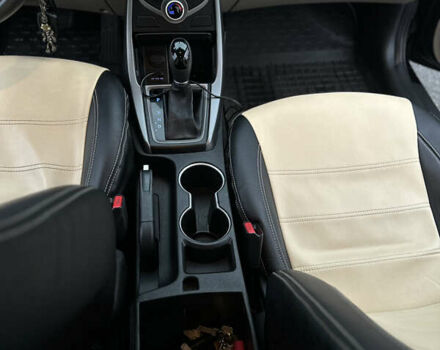 Черный Хендай Элантра, объемом двигателя 1.8 л и пробегом 200 тыс. км за 9500 $, фото 76 на Automoto.ua