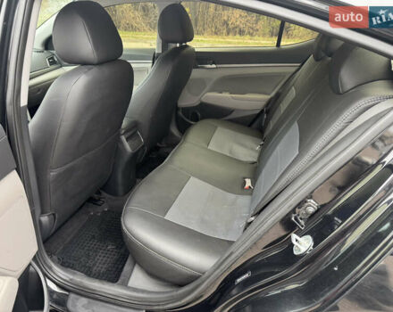 Черный Хендай Элантра, объемом двигателя 1.8 л и пробегом 90 тыс. км за 12000 $, фото 13 на Automoto.ua