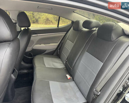 Черный Хендай Элантра, объемом двигателя 1.8 л и пробегом 90 тыс. км за 12000 $, фото 12 на Automoto.ua