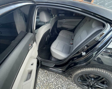 Чорний Хендай Елантра, об'ємом двигуна 2 л та пробігом 233 тис. км за 11800 $, фото 9 на Automoto.ua