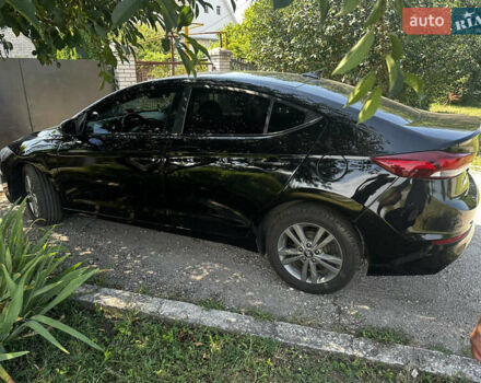 Чорний Хендай Елантра, об'ємом двигуна 2 л та пробігом 150 тис. км за 11200 $, фото 3 на Automoto.ua