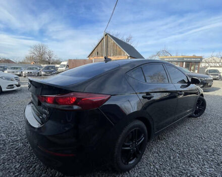 Чорний Хендай Елантра, об'ємом двигуна 2 л та пробігом 233 тис. км за 11800 $, фото 4 на Automoto.ua