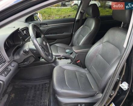 Черный Хендай Элантра, объемом двигателя 2 л и пробегом 150 тыс. км за 13400 $, фото 9 на Automoto.ua