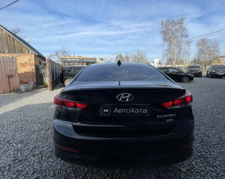 Чорний Хендай Елантра, об'ємом двигуна 2 л та пробігом 233 тис. км за 11800 $, фото 5 на Automoto.ua
