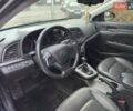 Черный Хендай Элантра, объемом двигателя 2 л и пробегом 150 тыс. км за 13400 $, фото 1 на Automoto.ua
