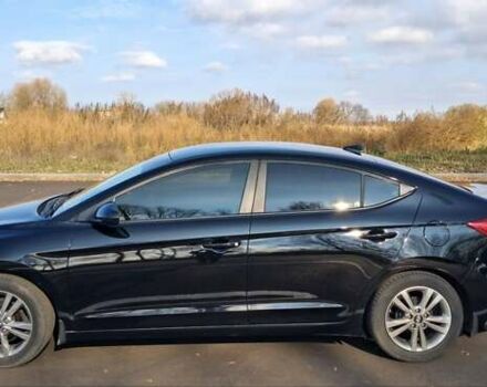 Черный Хендай Элантра, объемом двигателя 2 л и пробегом 75 тыс. км за 12500 $, фото 1 на Automoto.ua