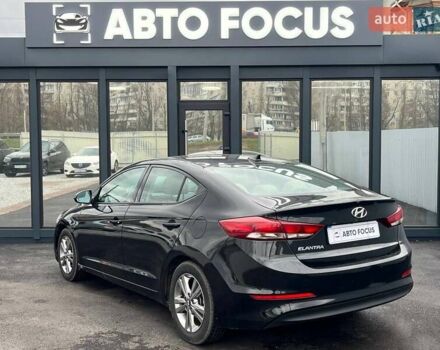 Чорний Хендай Елантра, об'ємом двигуна 2 л та пробігом 98 тис. км за 13990 $, фото 4 на Automoto.ua