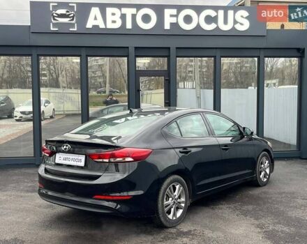 Чорний Хендай Елантра, об'ємом двигуна 2 л та пробігом 98 тис. км за 13990 $, фото 6 на Automoto.ua