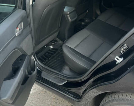 Черный Хендай Элантра, объемом двигателя 1.59 л и пробегом 210 тыс. км за 9300 $, фото 6 на Automoto.ua