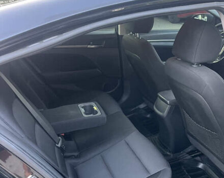 Черный Хендай Элантра, объемом двигателя 1.59 л и пробегом 210 тыс. км за 9300 $, фото 5 на Automoto.ua