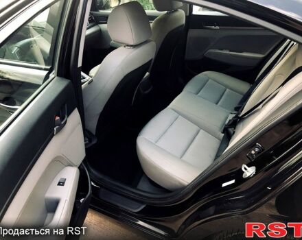 Черный Хендай Элантра, объемом двигателя 2 л и пробегом 120 тыс. км за 9900 $, фото 9 на Automoto.ua