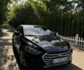 Черный Хендай Элантра, объемом двигателя 2 л и пробегом 96 тыс. км за 13500 $, фото 1 на Automoto.ua