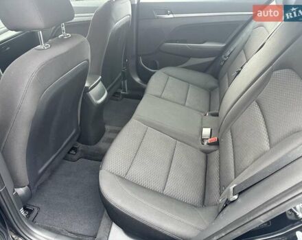 Черный Хендай Элантра, объемом двигателя 2 л и пробегом 75 тыс. км за 14200 $, фото 12 на Automoto.ua