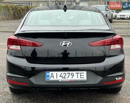 Черный Хендай Элантра, объемом двигателя 2 л и пробегом 94 тыс. км за 13200 $, фото 2 на Automoto.ua