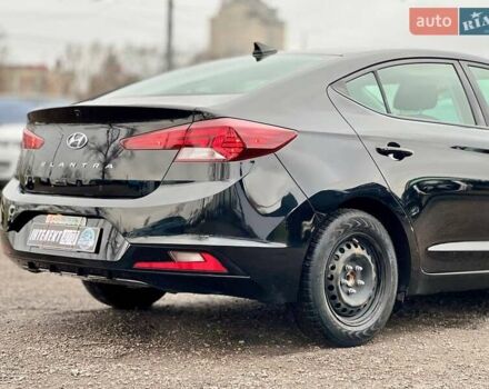 Чорний Хендай Елантра, об'ємом двигуна 2 л та пробігом 166 тис. км за 14300 $, фото 12 на Automoto.ua