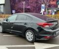 Черный Хендай Элантра, объемом двигателя 2 л и пробегом 139 тыс. км за 13590 $, фото 4 на Automoto.ua