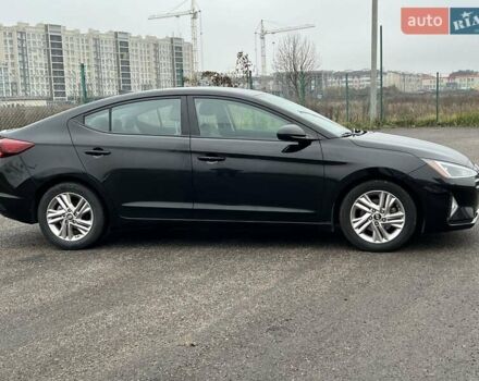 Черный Хендай Элантра, объемом двигателя 2 л и пробегом 94 тыс. км за 13200 $, фото 3 на Automoto.ua