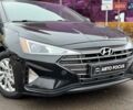 Черный Хендай Элантра, объемом двигателя 2 л и пробегом 139 тыс. км за 13590 $, фото 1 на Automoto.ua